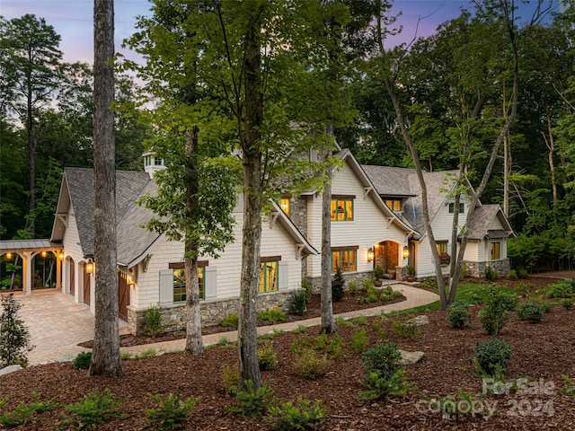 view of front of property with a carport