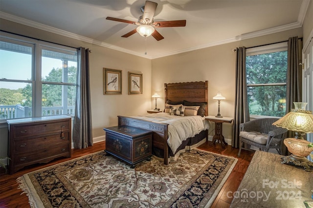 bedroom featuring ceiling fan, crown molding, and dark hardwood / wood-style floors