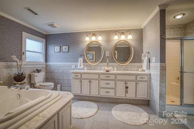 full bathroom featuring vanity, separate shower and tub, crown molding, tile walls, and tile patterned flooring