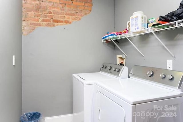 washroom featuring separate washer and dryer