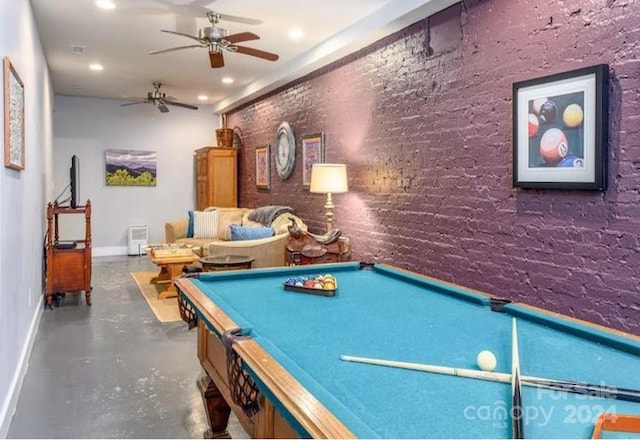 game room with ceiling fan, brick wall, and pool table