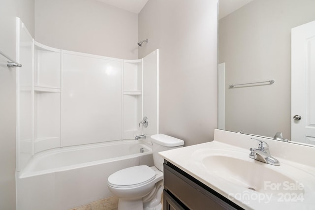 full bathroom featuring tile patterned flooring, toilet, vanity, and shower / washtub combination