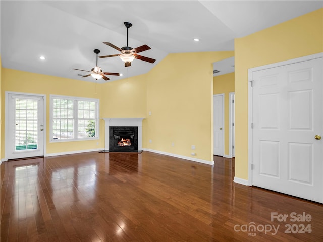 unfurnished living room featuring a fireplace, ceiling fan, hardwood / wood-style floors, and lofted ceiling