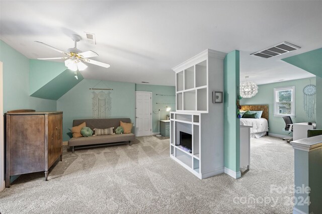 sitting room with baseboards, carpet flooring, visible vents, and a ceiling fan