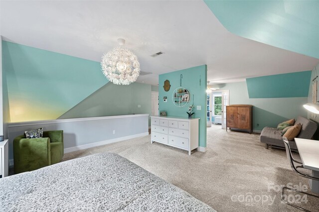 carpeted bedroom with a notable chandelier, vaulted ceiling, visible vents, and baseboards