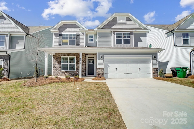 craftsman inspired home with an attached garage, driveway, stone siding, and a front yard