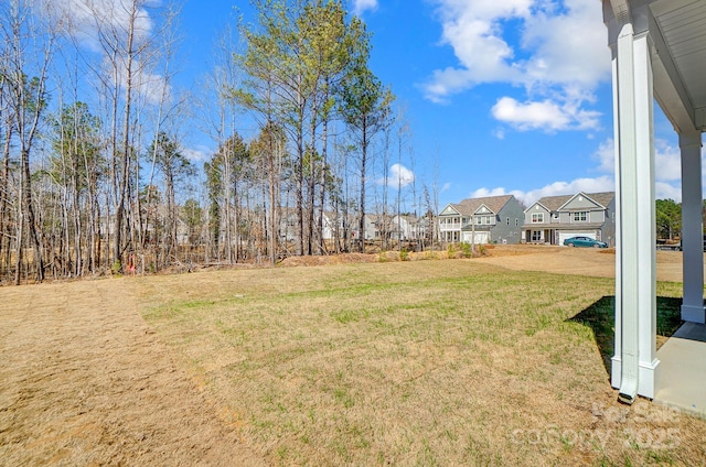 view of yard featuring a residential view