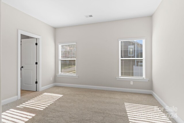 view of carpeted spare room