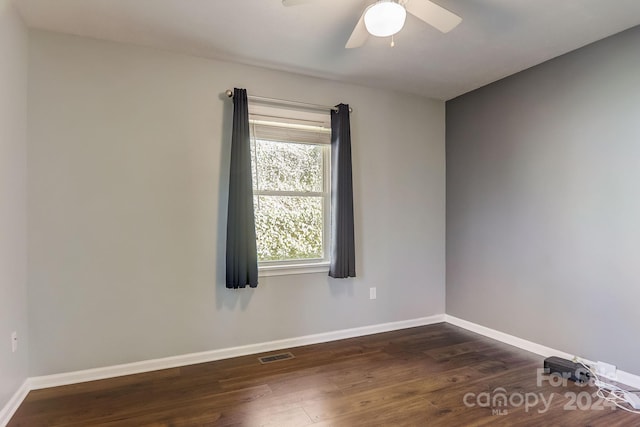 spare room with ceiling fan and hardwood / wood-style floors