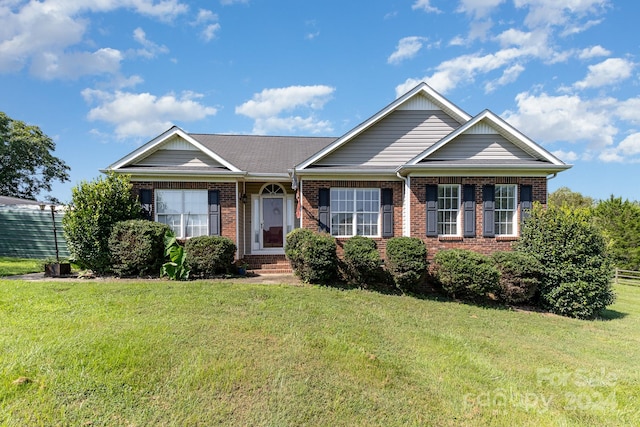 view of front of home with a front yard