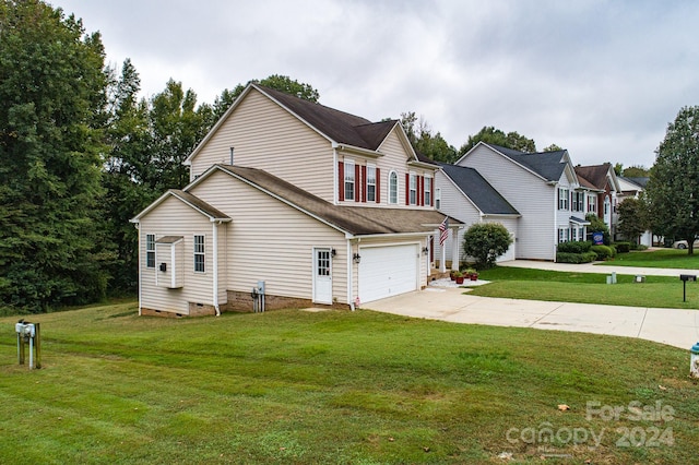 front facade with a front yard and a garage