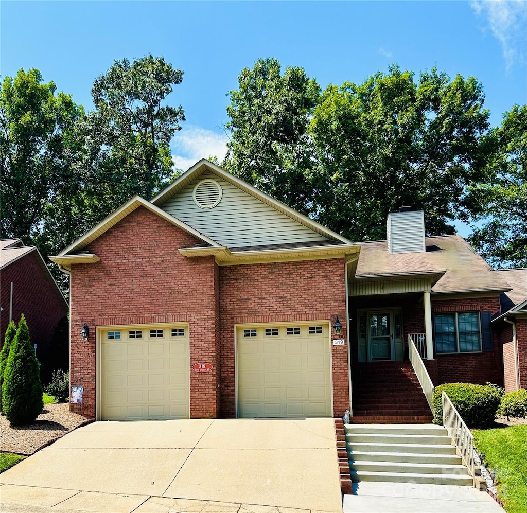 view of front of home with a garage