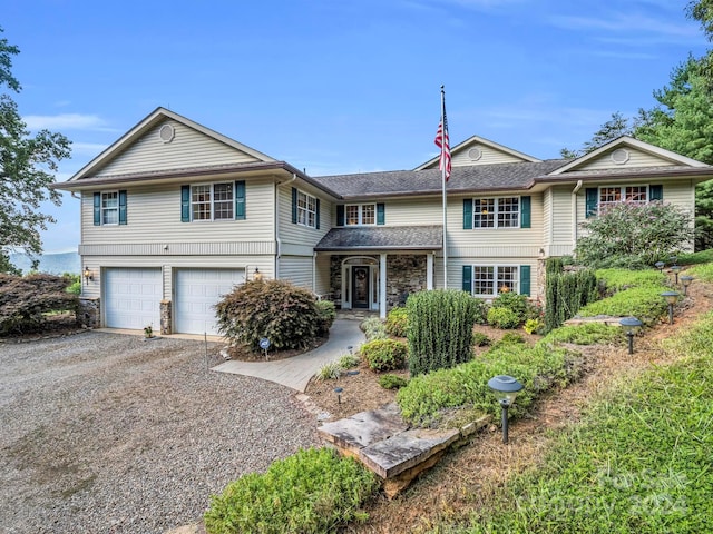 view of front of property with a garage