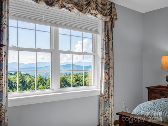 bedroom with a mountain view