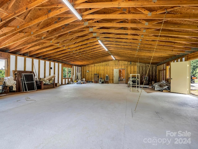 misc room with vaulted ceiling and a wealth of natural light