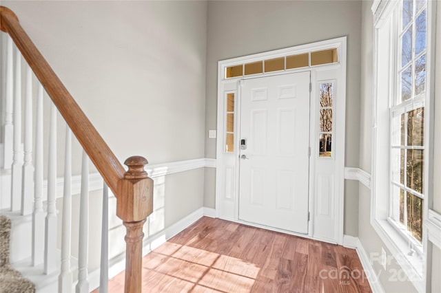 entrance foyer with light hardwood / wood-style floors