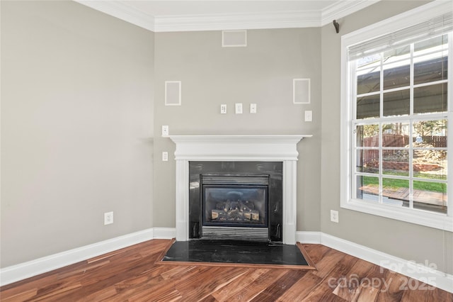 room details featuring hardwood / wood-style floors and ornamental molding