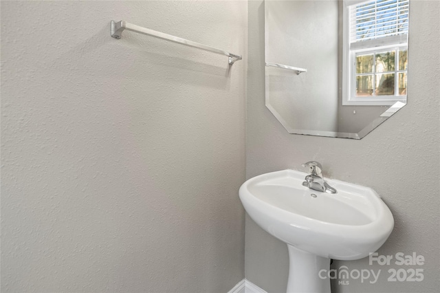 bathroom featuring sink