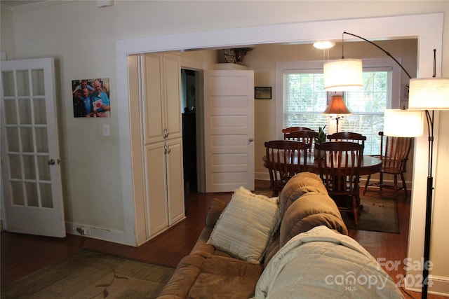 dining area with dark hardwood / wood-style floors