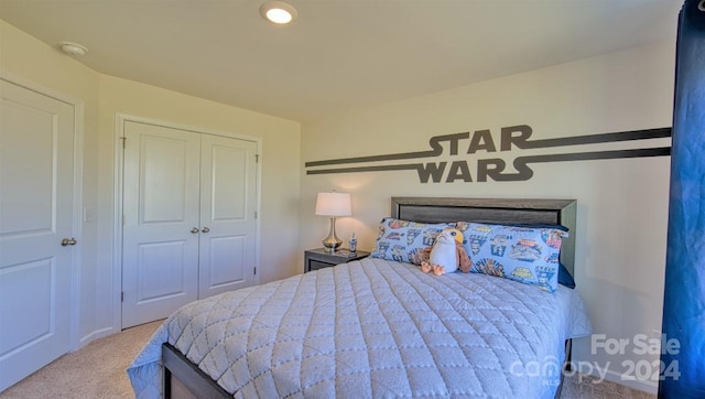 bedroom featuring a closet and carpet