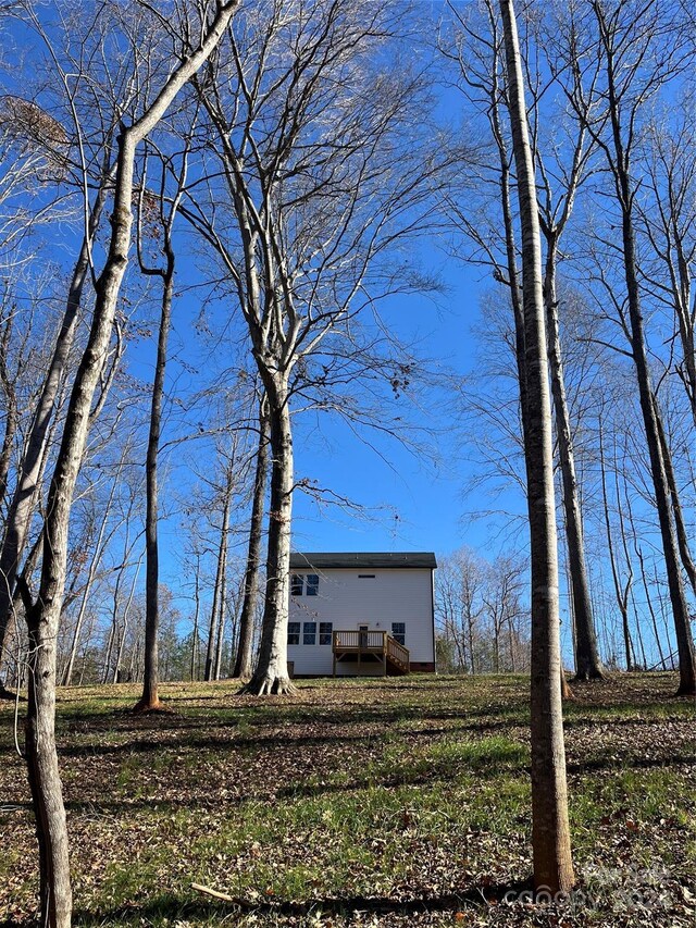 view of front of property featuring a wooden deck