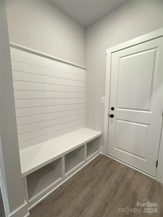 mudroom with dark hardwood / wood-style floors