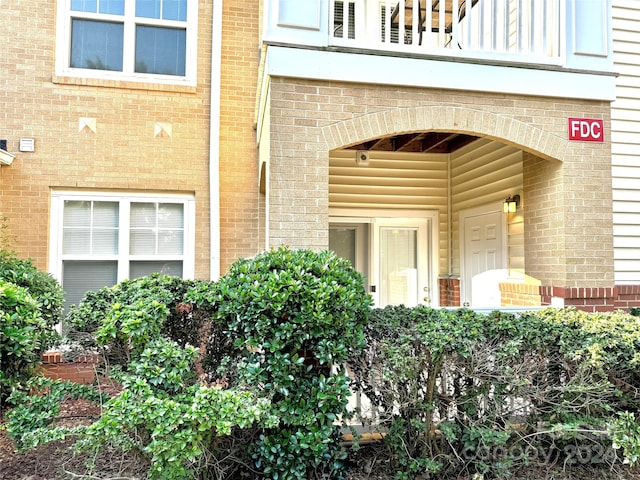 doorway to property with a balcony