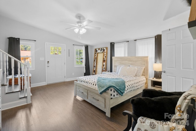 bedroom with lofted ceiling, wood-type flooring, and ceiling fan