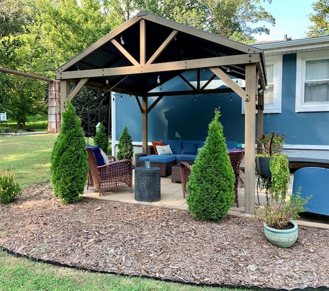 view of patio with outdoor lounge area and a gazebo