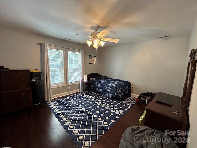 bedroom featuring ceiling fan and wood-type flooring