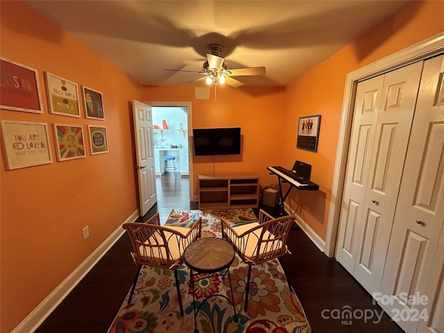 dining area with hardwood / wood-style floors and ceiling fan