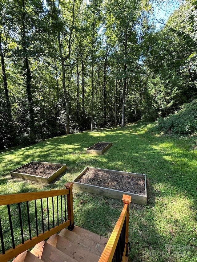 view of yard featuring a wooden deck