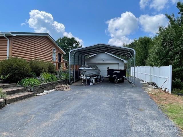 view of parking featuring a carport