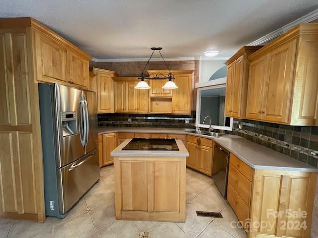 kitchen with a kitchen island, decorative backsplash, light tile patterned floors, and black appliances