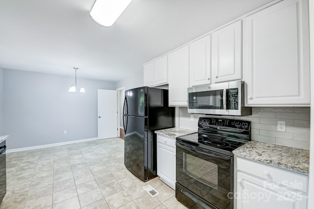 kitchen featuring white cabinets, hanging light fixtures, black appliances, and backsplash