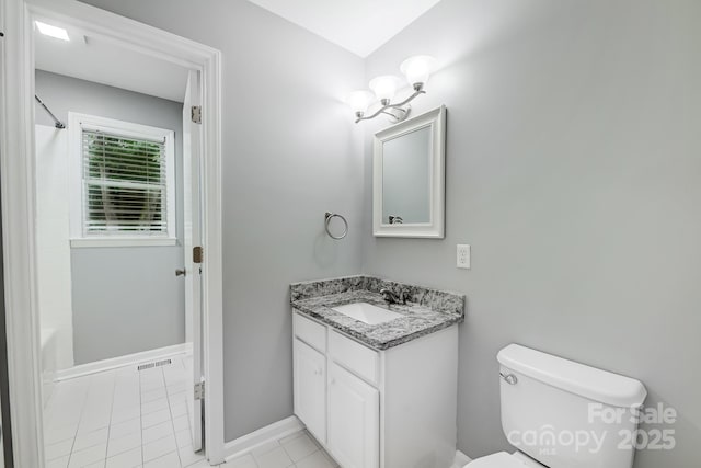 full bathroom with toilet, vanity, tile patterned flooring, and shower / bath combination