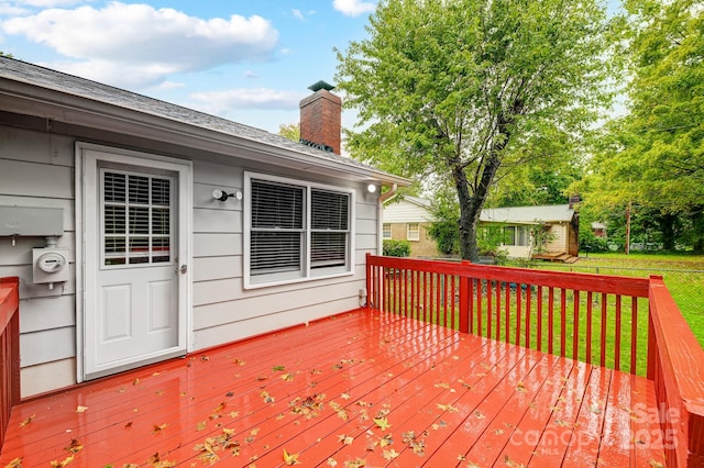 deck featuring a yard