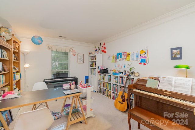 home office with carpet floors and crown molding