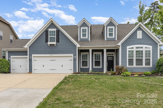 view of front facade featuring an attached garage, a shingled roof, concrete driveway, and a front lawn