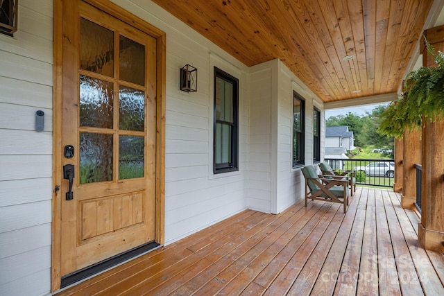 wooden deck featuring a porch