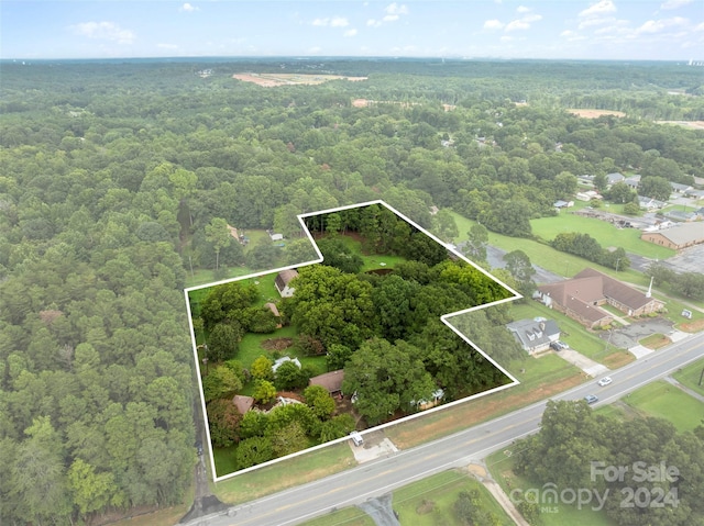 4539 S New Hope Rd, Gastonia, NC 28056 - birds eye view of property featuring a wooded view