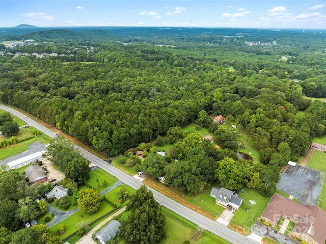4539 S New Hope Rd, Gastonia, NC 28056 - birds eye view of property featuring a wooded view