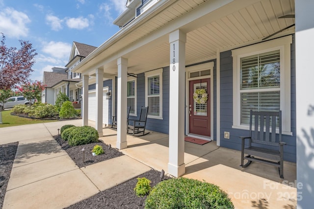 entrance to property featuring covered porch