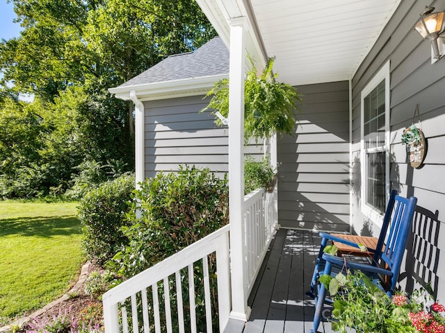 deck featuring a yard