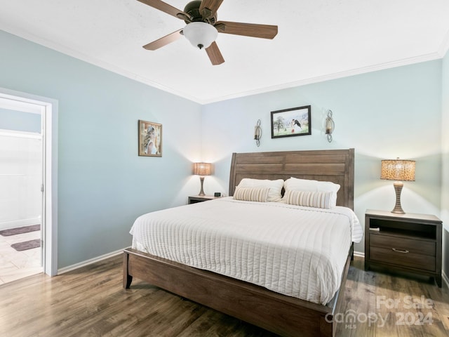 bedroom featuring dark hardwood / wood-style flooring, ornamental molding, connected bathroom, and ceiling fan