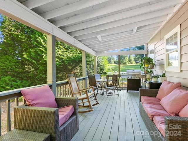 wooden deck featuring area for grilling and outdoor lounge area