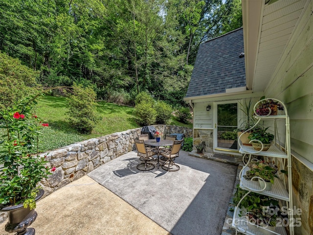 view of patio featuring outdoor dining space