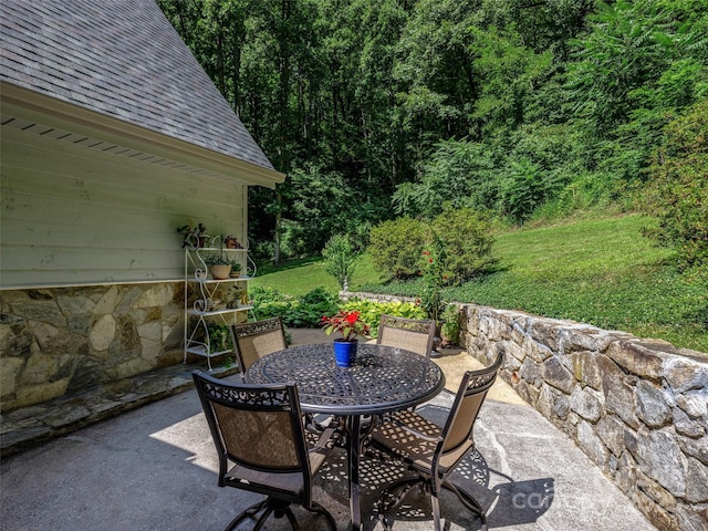 view of patio featuring outdoor dining space