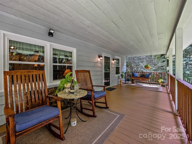 wooden deck with a porch