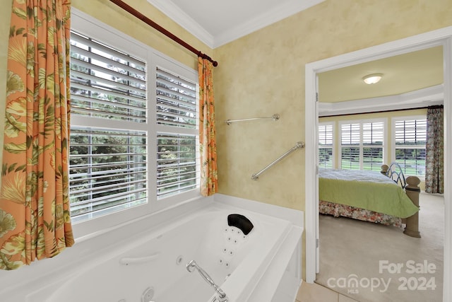 bathroom with ornamental molding, a bath, and tile patterned floors